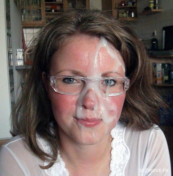 Facial cumshot of the month 05/2023 - girl get a huge load of cum over her face and her glasses while homemade photo shooting.